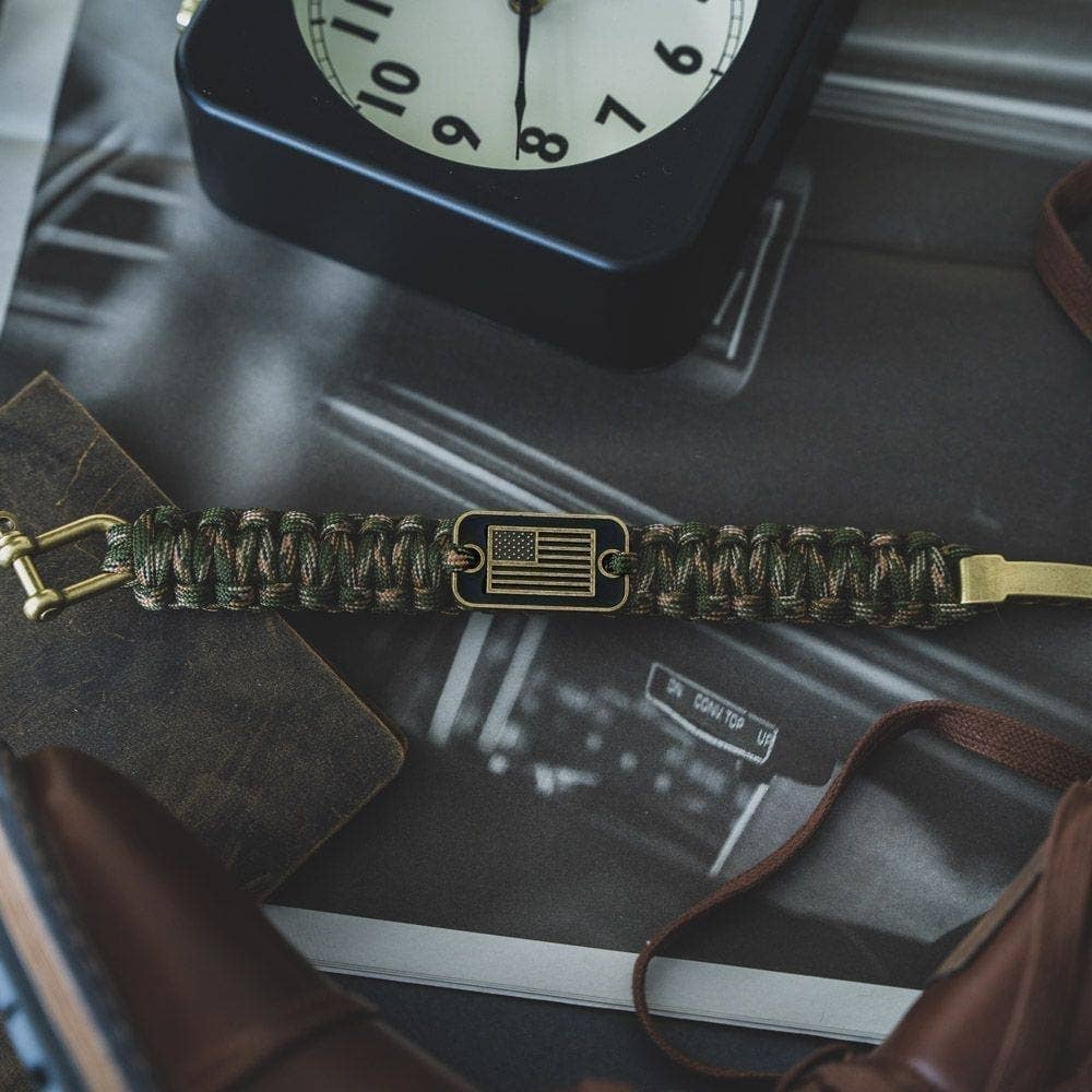 The Hero Company-Camo Paracord Bronze Flag Bracelet- Helps Pair Veterans With A Companion Dog- Faire