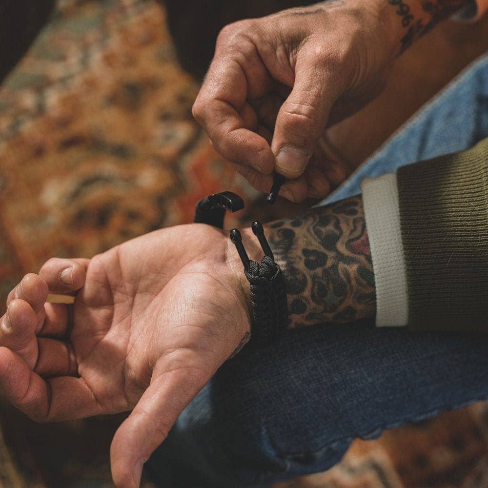 The Hero Company-Camo Paracord Bronze Flag Bracelet- Helps Pair Veterans With A Companion Dog- Faire