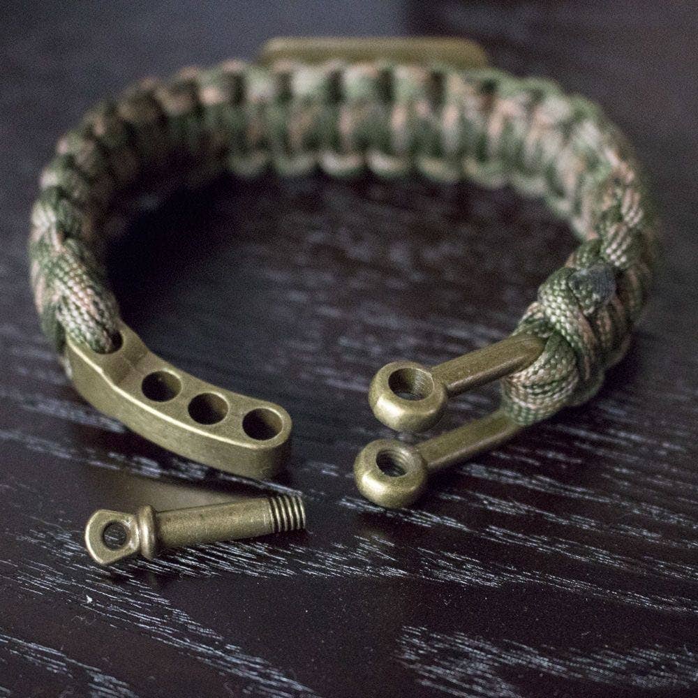 The Hero Company-Camo Paracord Bronze Flag Bracelet- Helps Pair Veterans With A Companion Dog- Faire